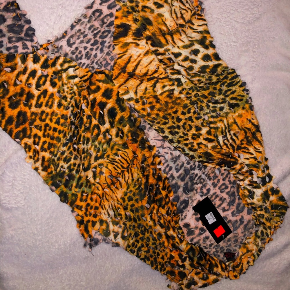 Tattered brand new animal print vest